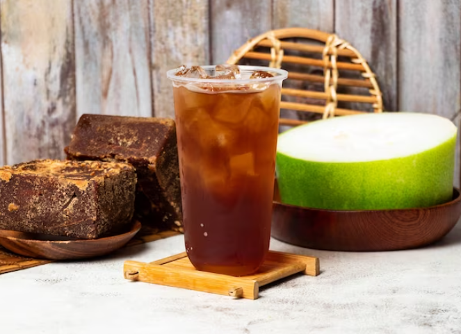 A side-by-side comparison of winter melon tea with different levels of sweetness to visually represent the adjustment process.