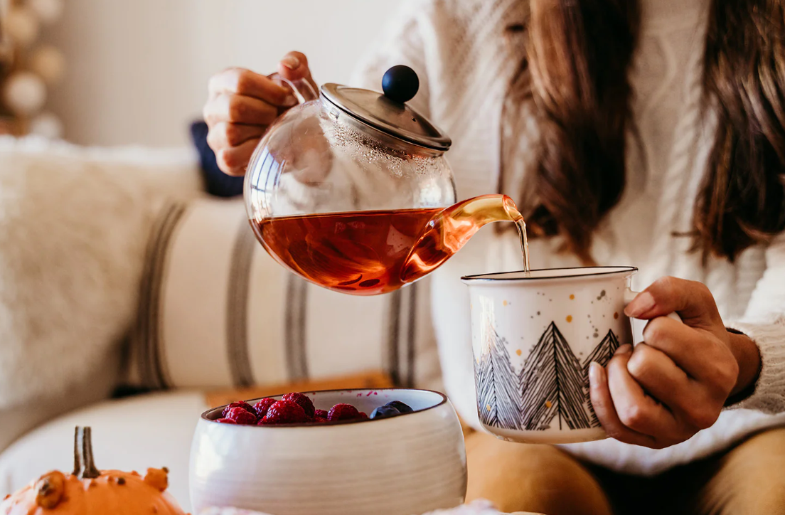 Step-by-step images of the rue tea brewing process, including boiling water, adding rue leaves, steeping, and straining.